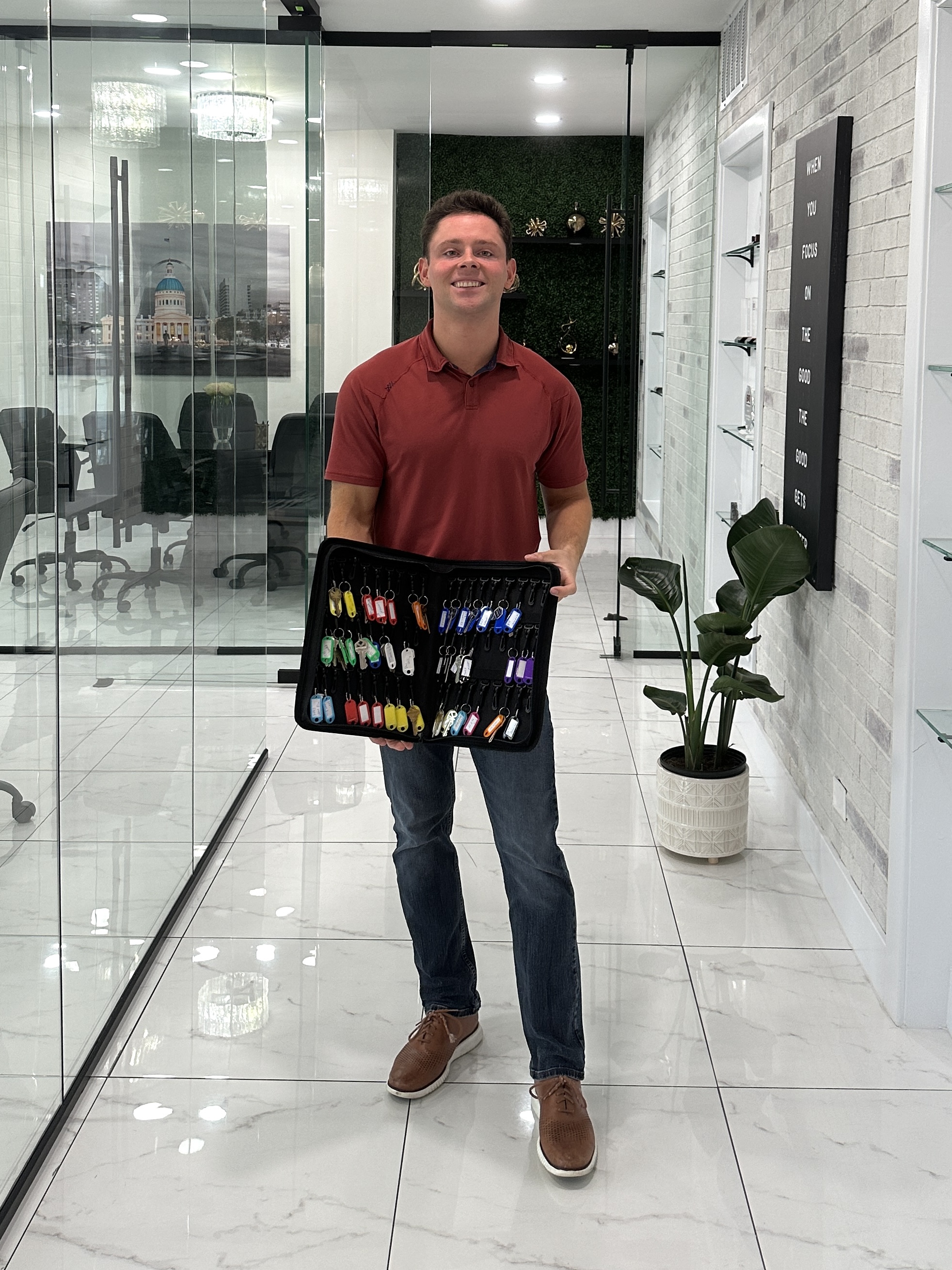 Jordan Cooper smiling in the First Door office